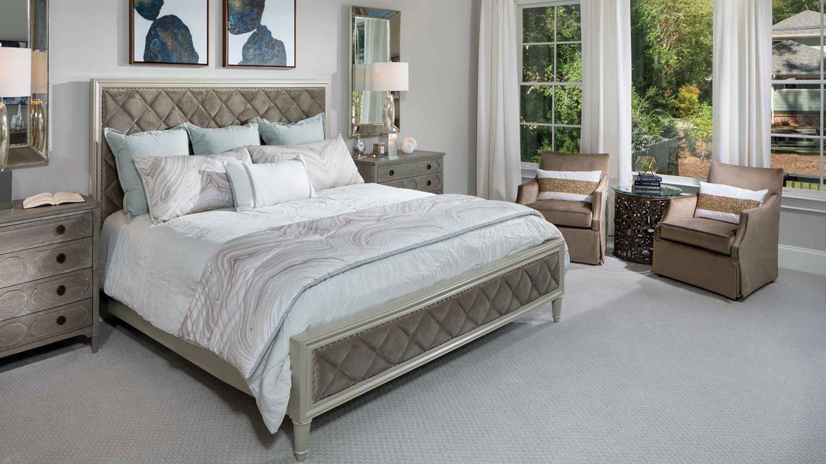 master bedroom gray monochromatic design sitting area plush bed frame