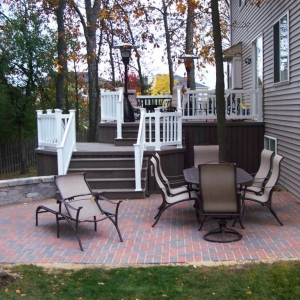 Ocean County NJ Multi level trex deck with brick paver patio and retaining wall