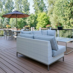 NJ custom 2nd floor Trex deck with white wicker patio furniture, glass table, white and wood railings
