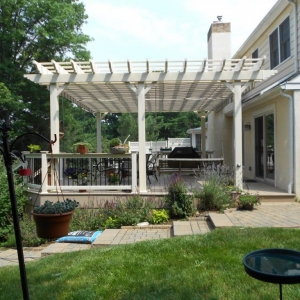 Ocean County NJ Trex deck with white pergola paver patio