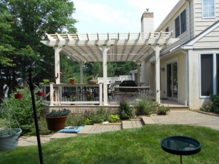 Ocean County NJ Trex deck with white pergola paver patio