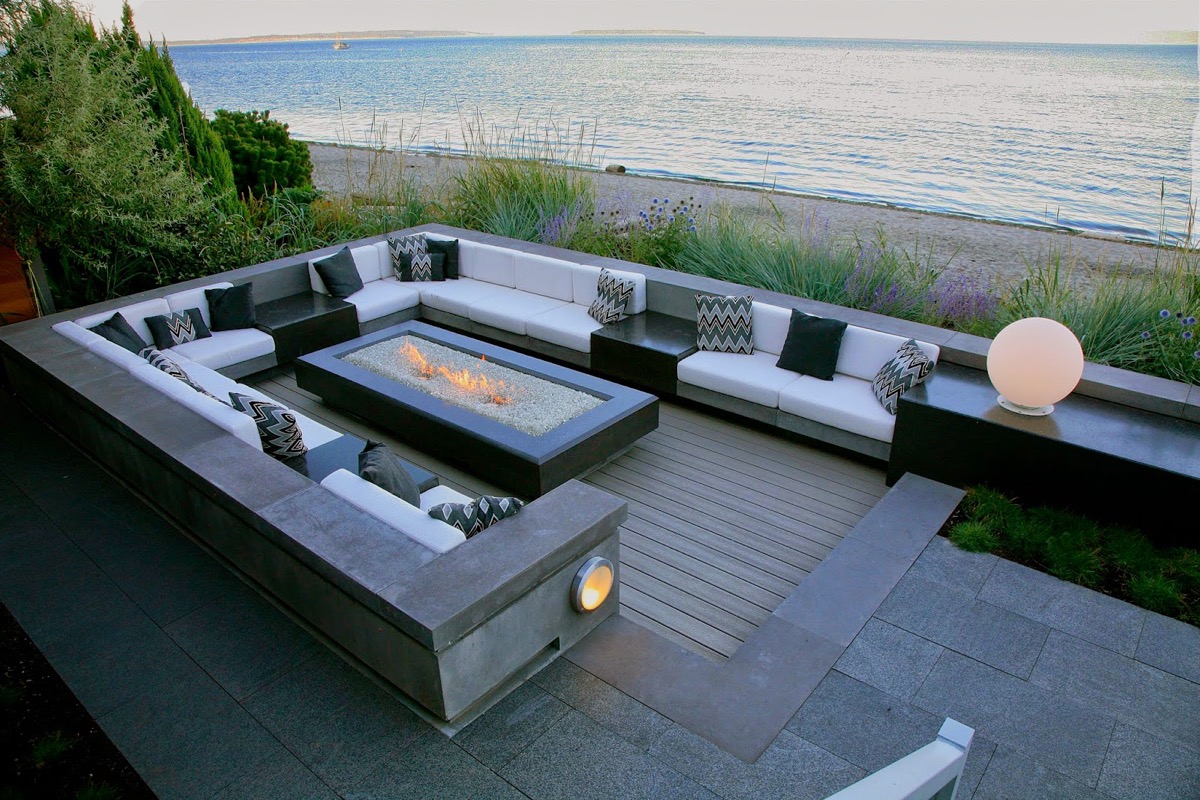 Jersey Shore deck builder gray oceanfront deck with gray paver patio white cushions concrete built in benches