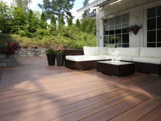 NJ Timbertech decking with Block retaining wall, wicker patio furnite with white cushions