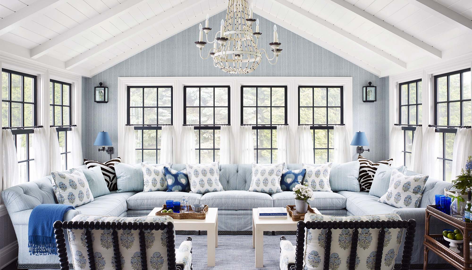 blue and white theme sunroom chandelier cathedral ceilings beadboard exposed beams nj custom sunroom builder