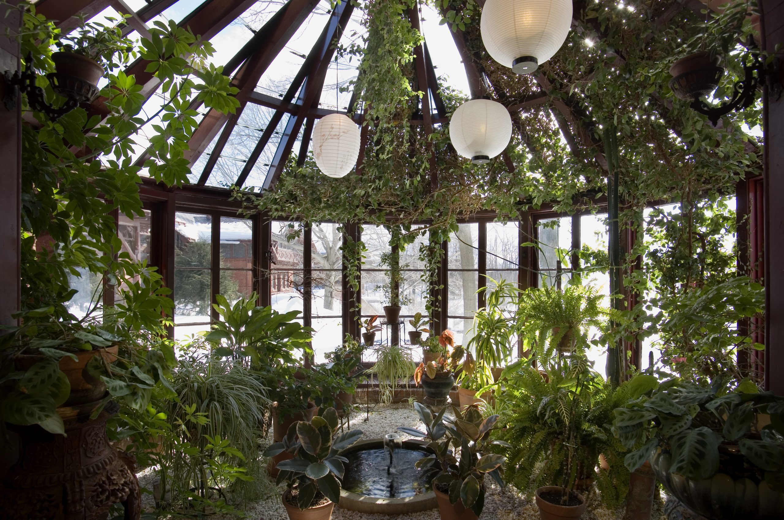 sunroom conservatory tons of plants glass ceiling nj custom sunroom builder Gambrick all wood sunroom
