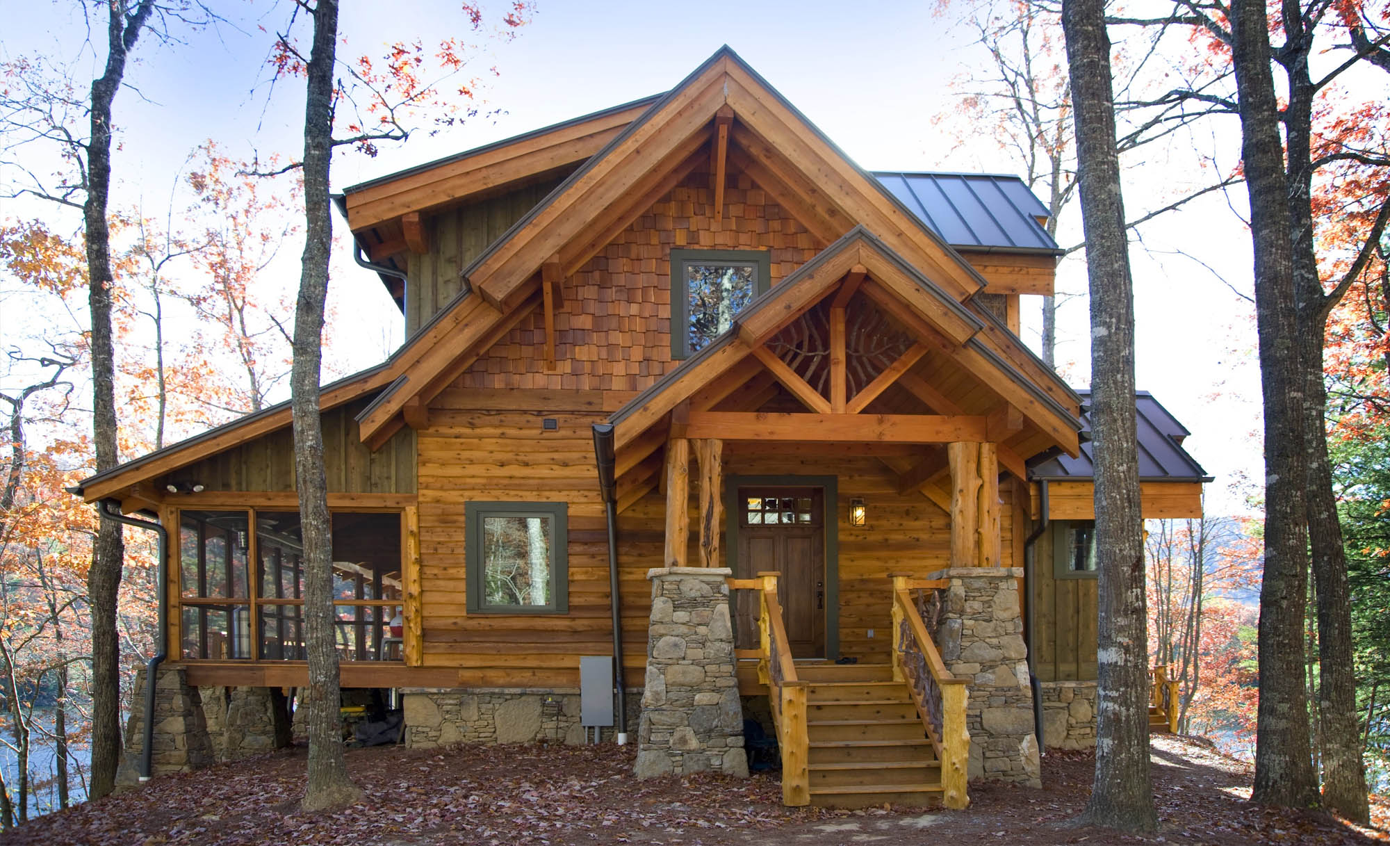 top small house siding color ideas - lake house with cedar siding