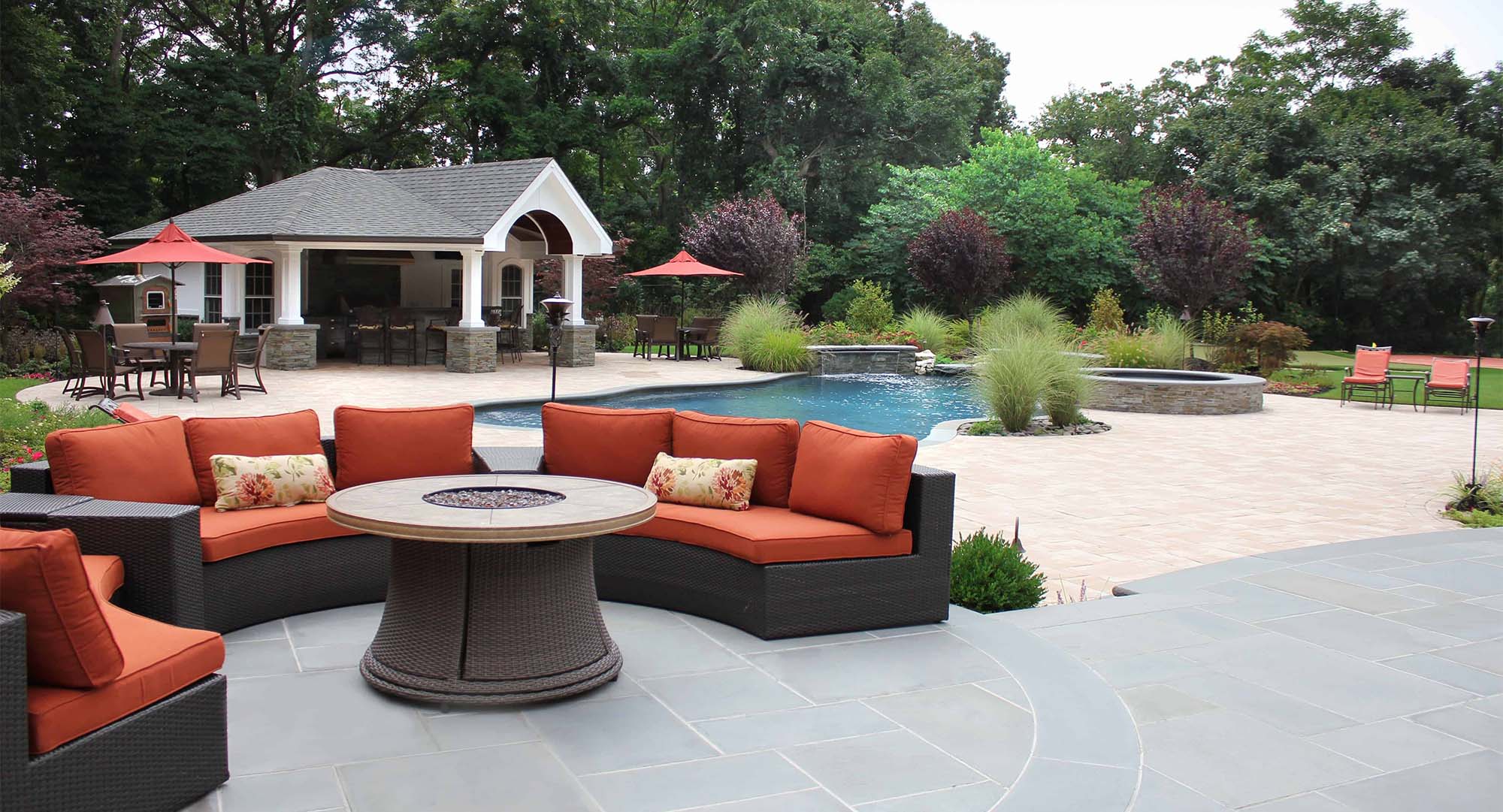 pool house designs blue stone patio wicker with red cushions real stone pillars Azek trim