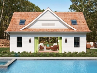cute pool house design open french doors white siding green curtains stone tile