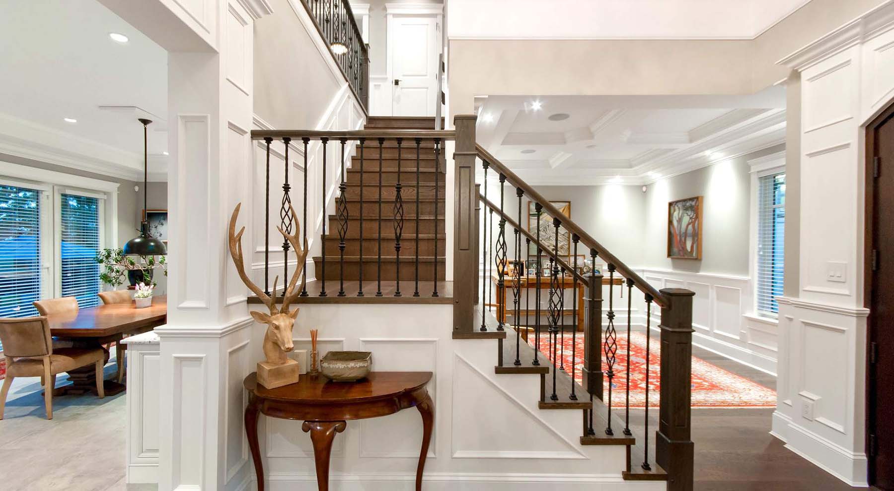 What's The Difference Between A Stair Tread & A Stair Riser? Beautiful white and oak staircase