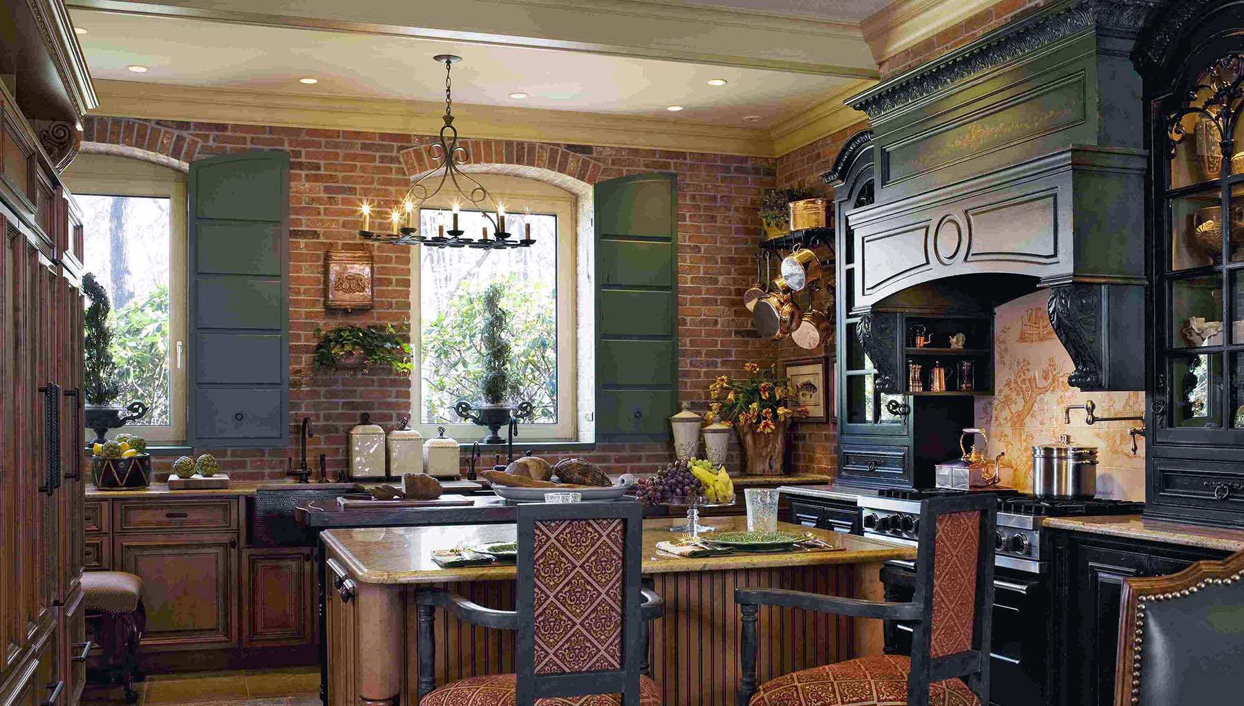 country kitchen with brick walls and wood cabinets stone countertop black cabinets red brick backsplash