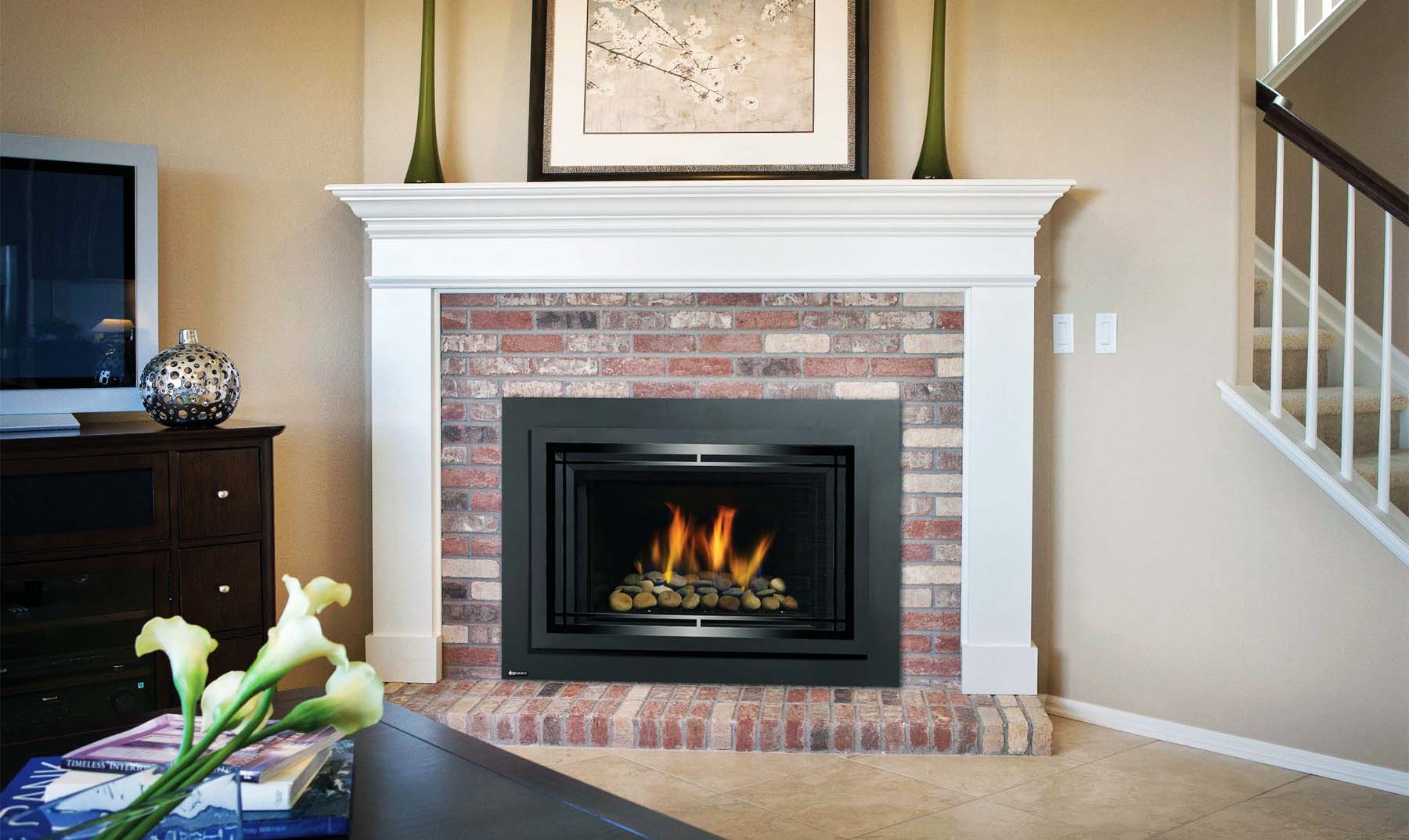 red brick living room fireplace with wood surround and top shelf white with tan walls