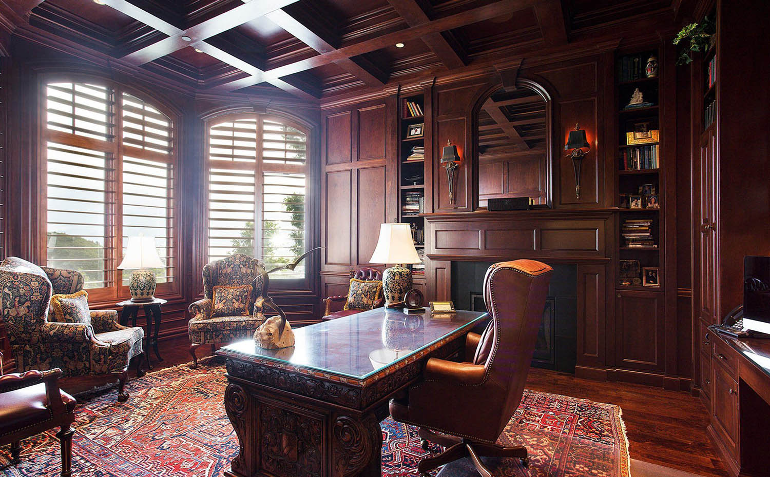 Home office with mahogany wood walls and matching coffered ceiling.