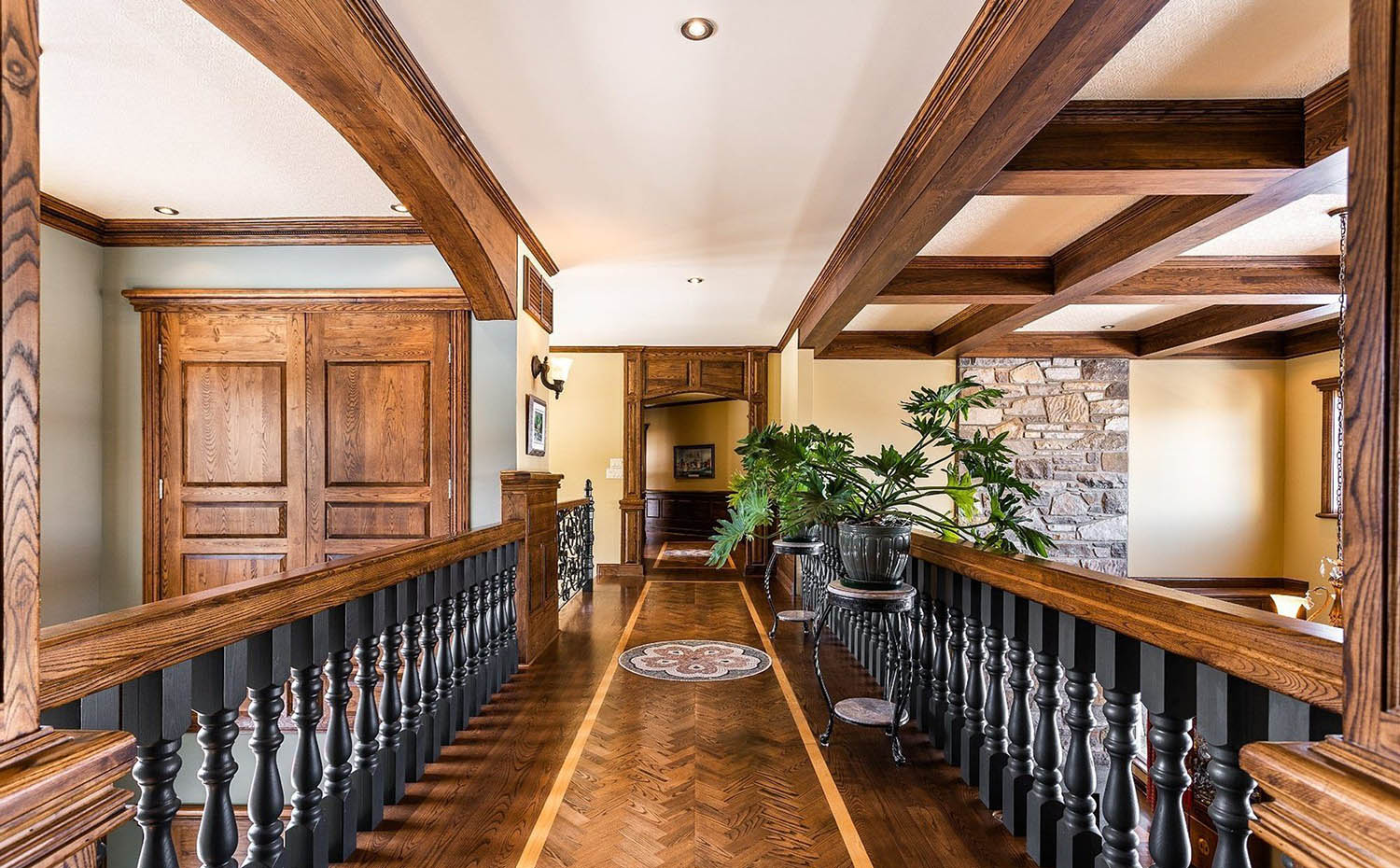 Real wood solid timber dropped beam coffered ceiling in a rustic styled home.