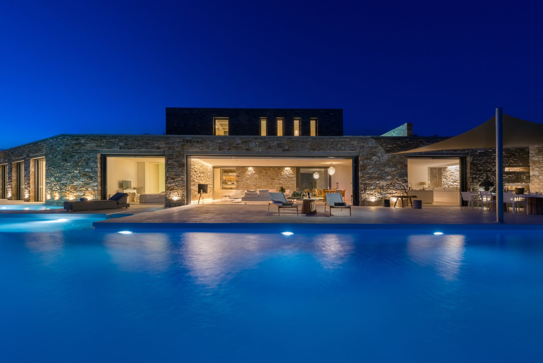 View of this beautiful Modern Home from the infinity pool.