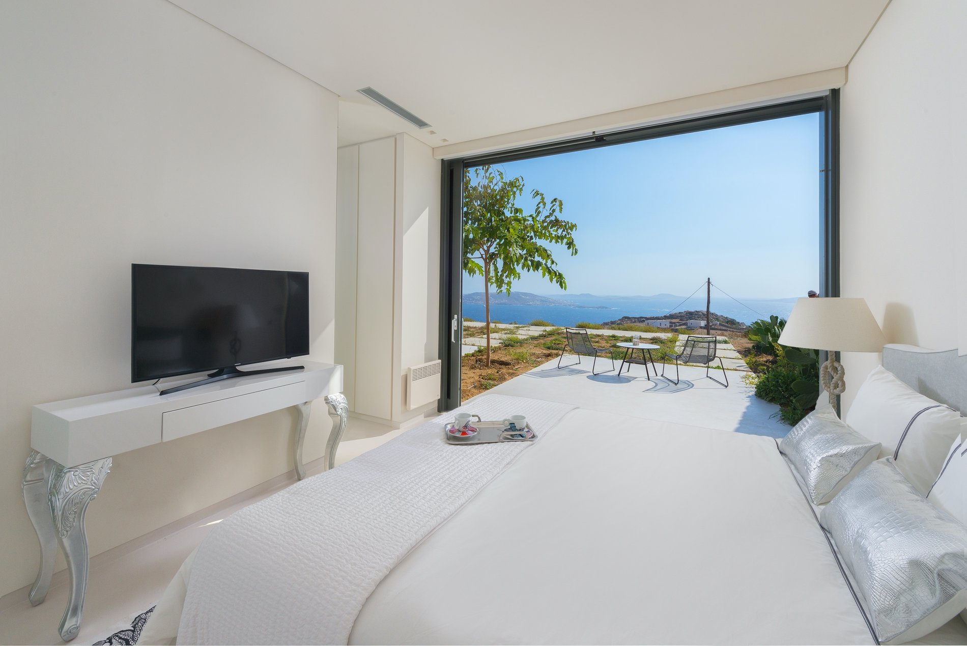 Each bedroom has it's own gliding patio door with Mediterranean views.