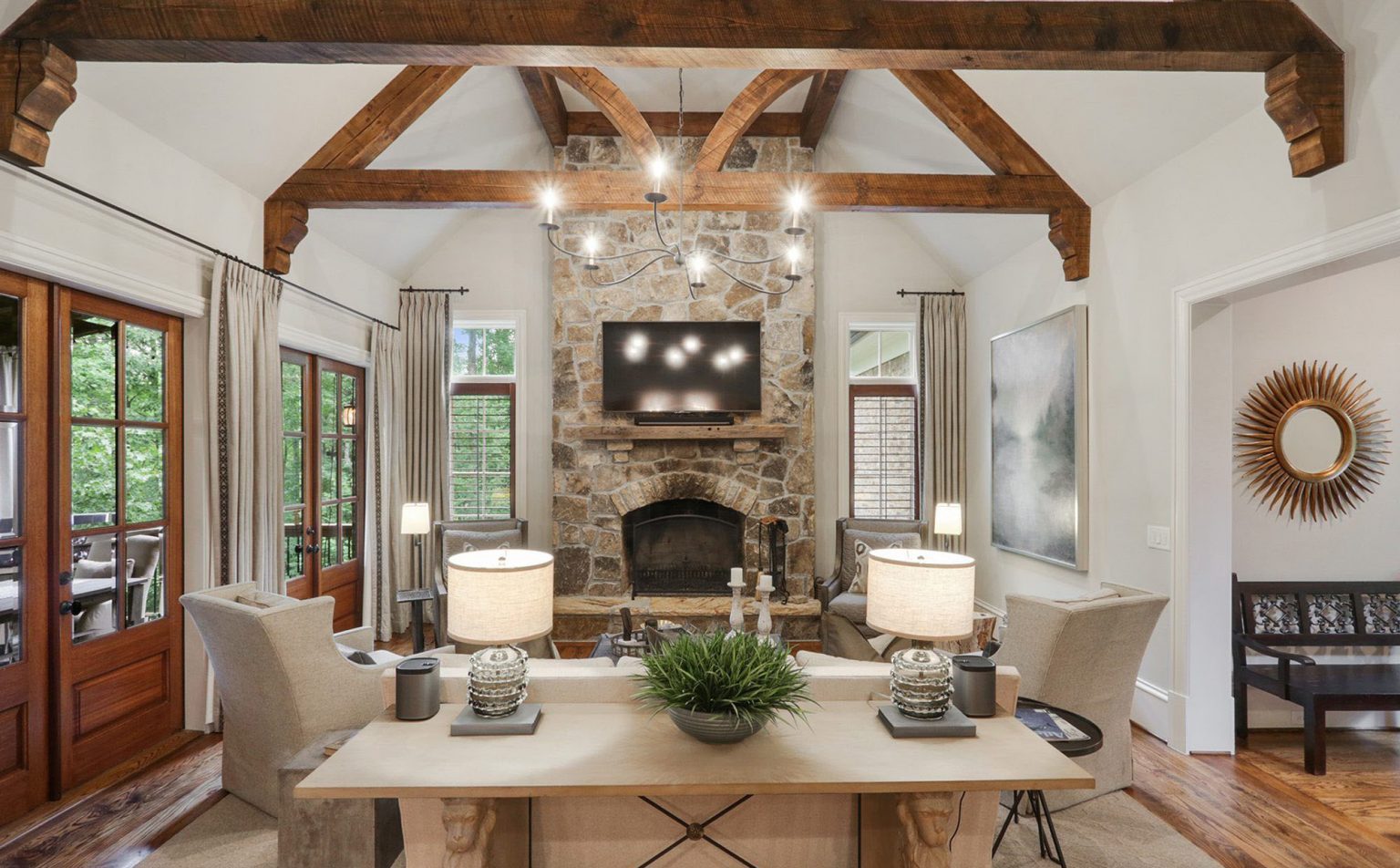 vaulted living room with beams