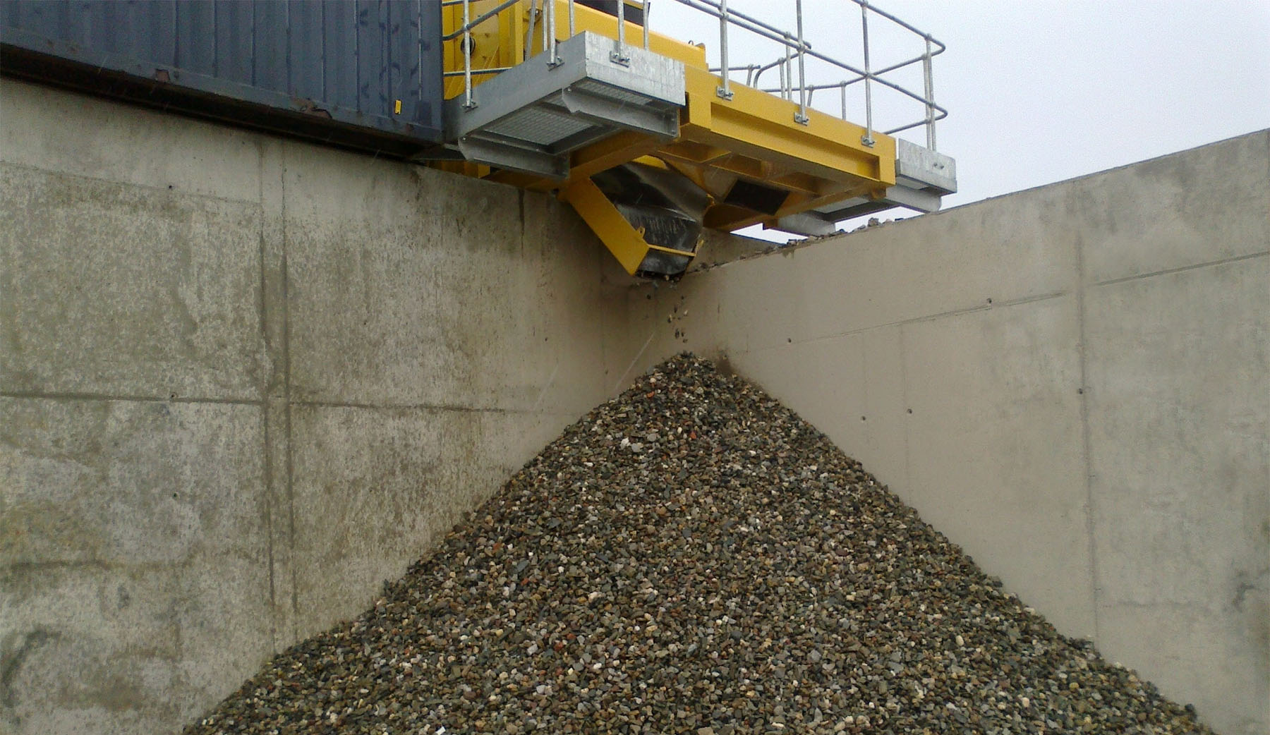 large machines used to break down concrete into aggregate