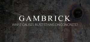 what causes rust stains on concrete banner
