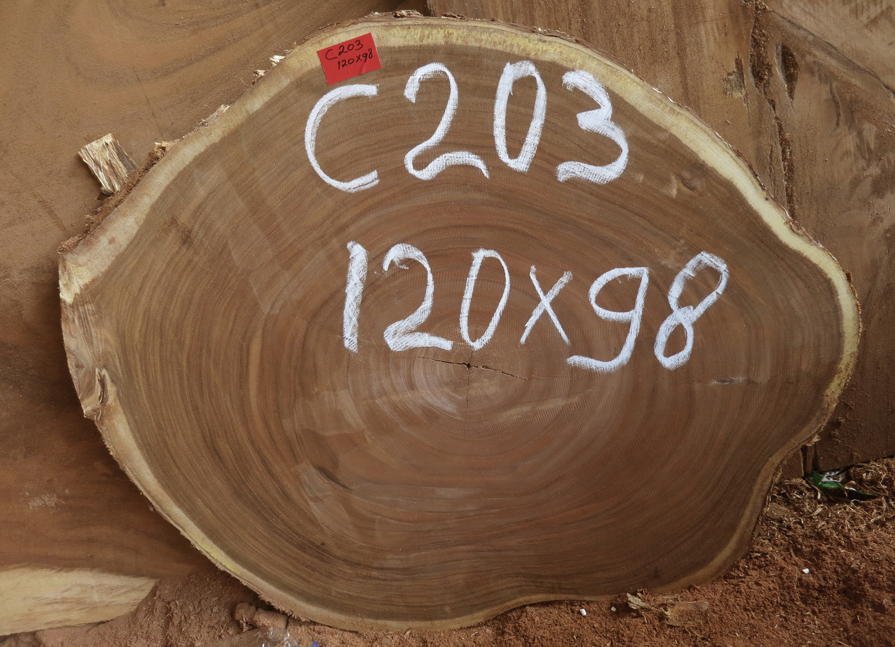 Acacia wood slab marked at the supplier. 