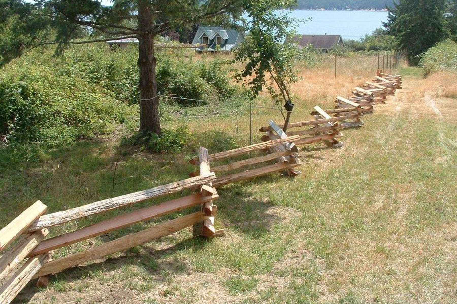 wood snake rail style fence in the country