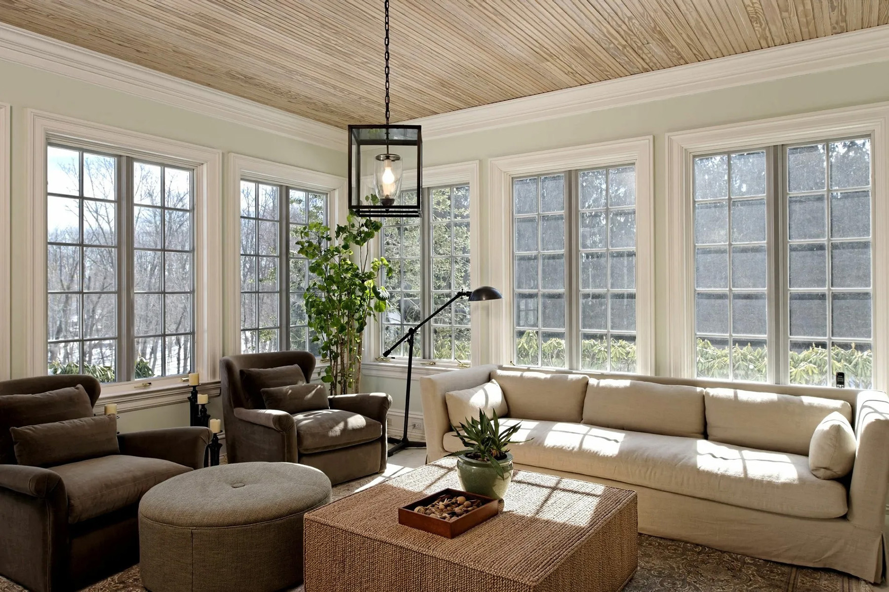 Thin T&G sunroom ceiling with a natural finish.