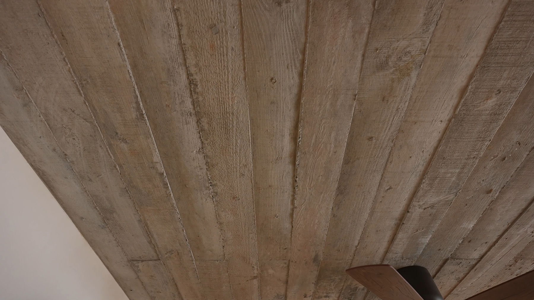 Closeup pic of board form concrete on the ceiling.