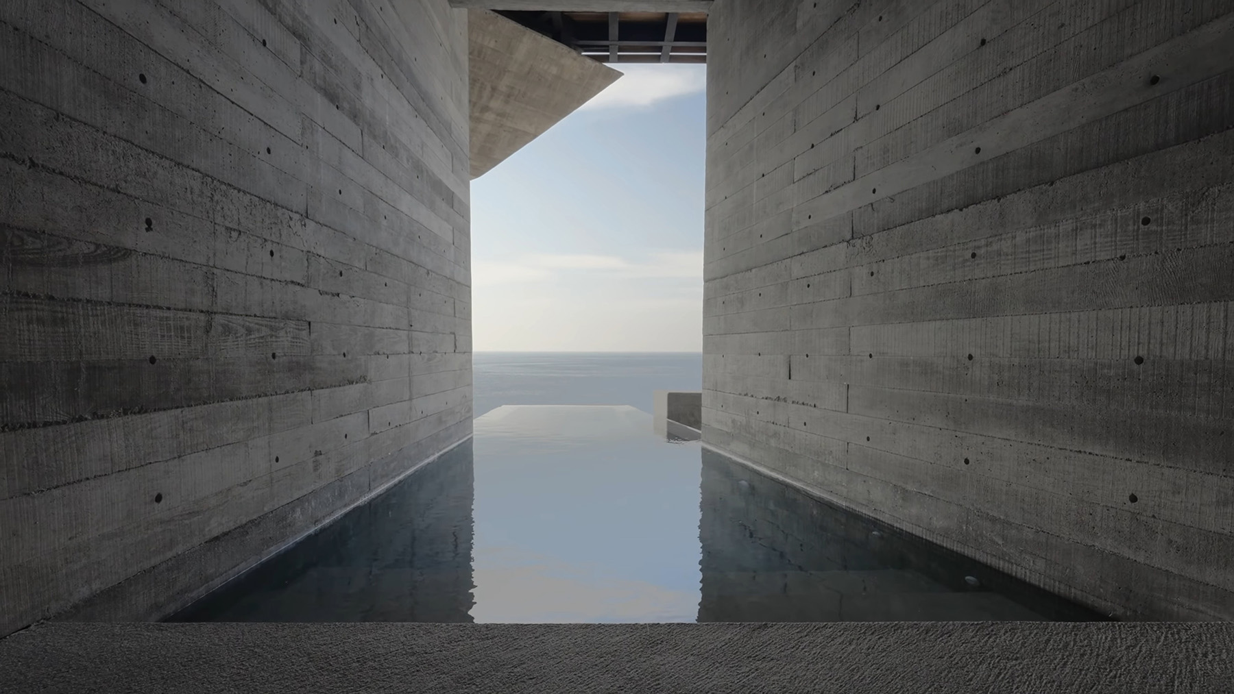 Horizontal board form used on the walls of this stunning modern pool.