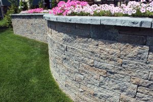 stacked paver stone retaining wall