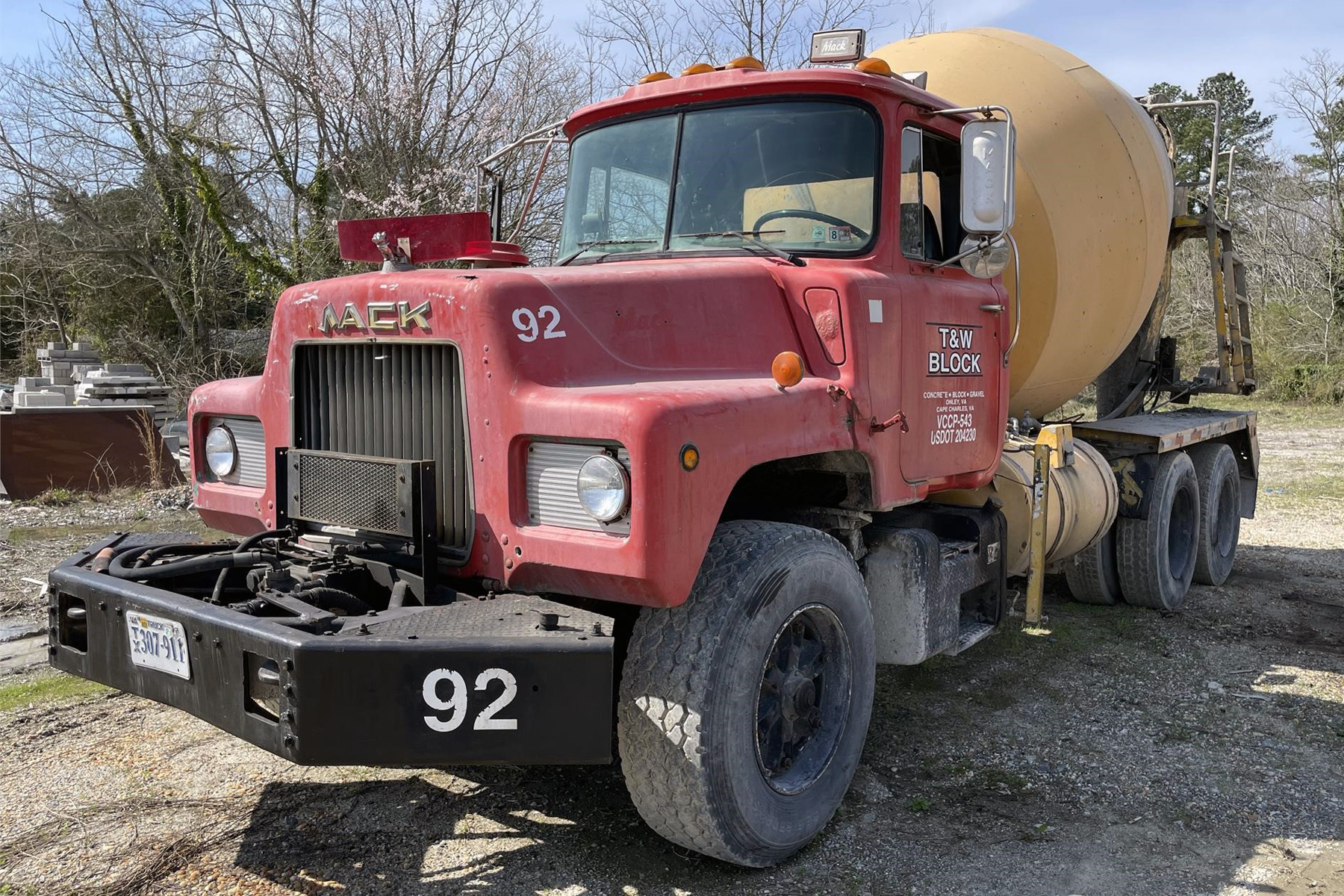 concrete truck holding 8 yards of concrete weighing 60,000 pounds