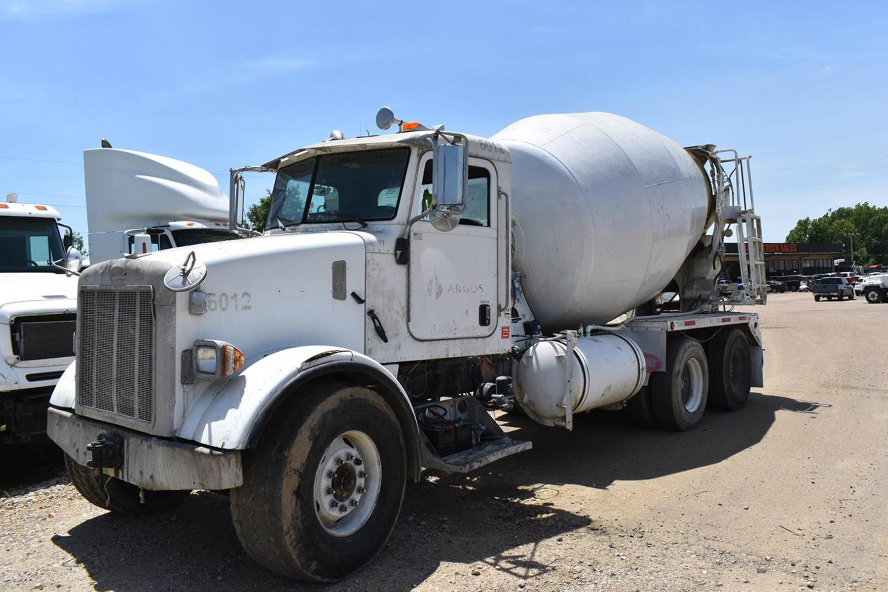 white concrete mixer truck 8 yards 55,000 lbs. 