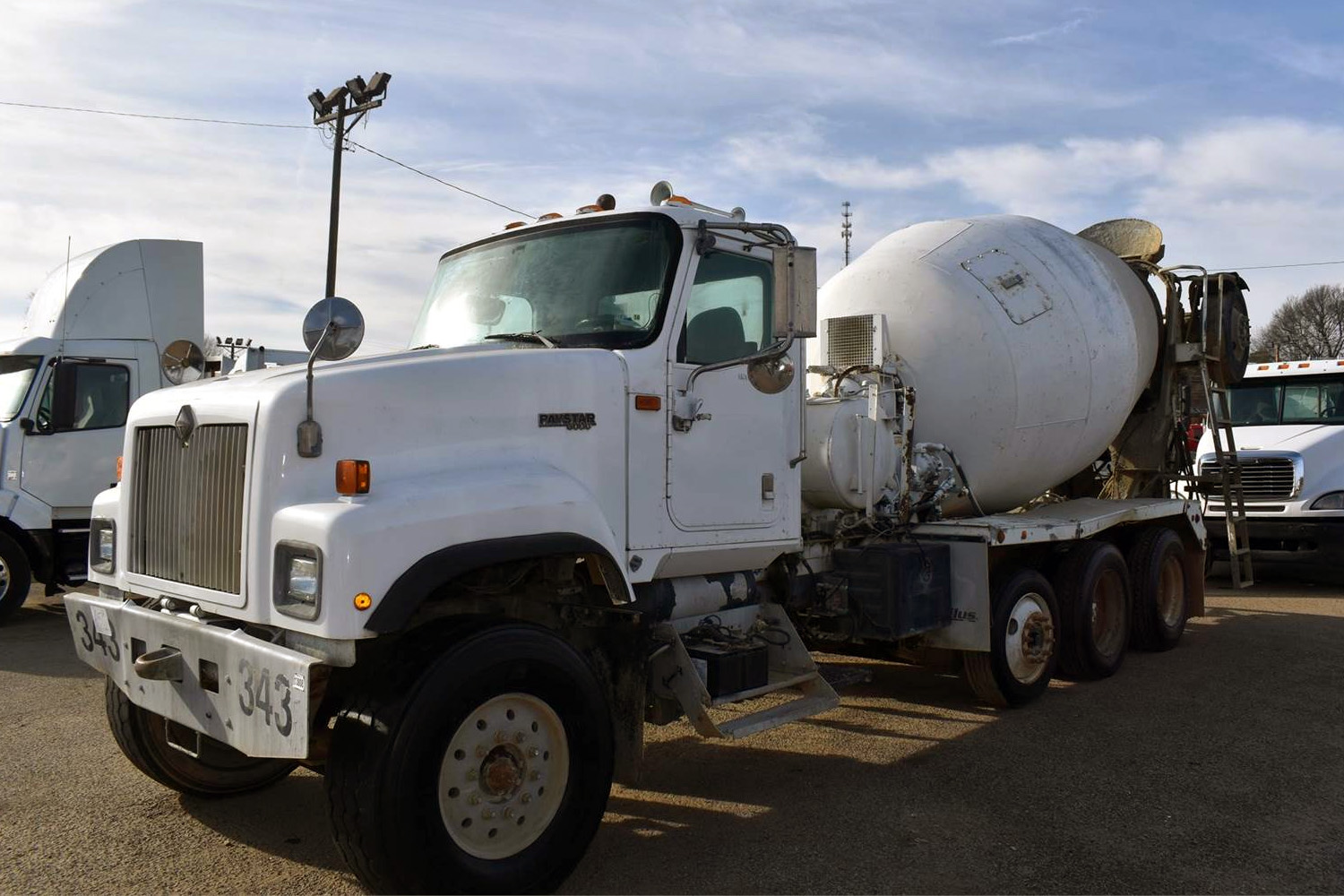 Powerstar concrete mixing truck with an 8-10 yard capacity.
