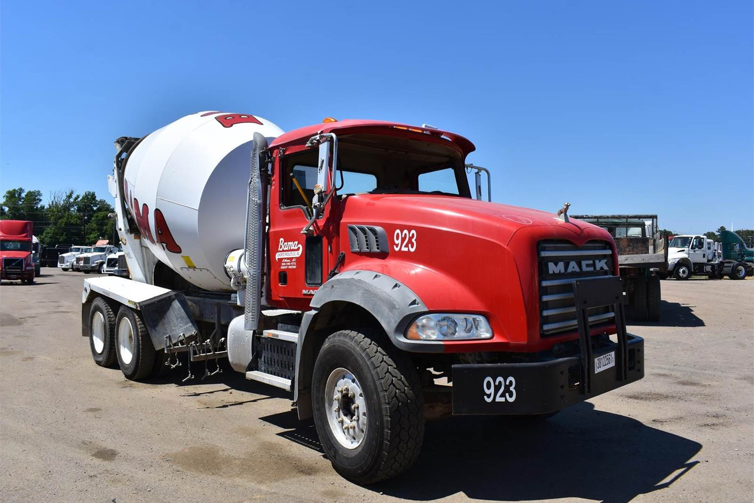 Rear pouring 8-10 yard capacity concrete truck made by Mack.