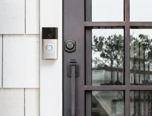 Ring Doorbell, iron & glass front door, white cedar shake siding 1.0