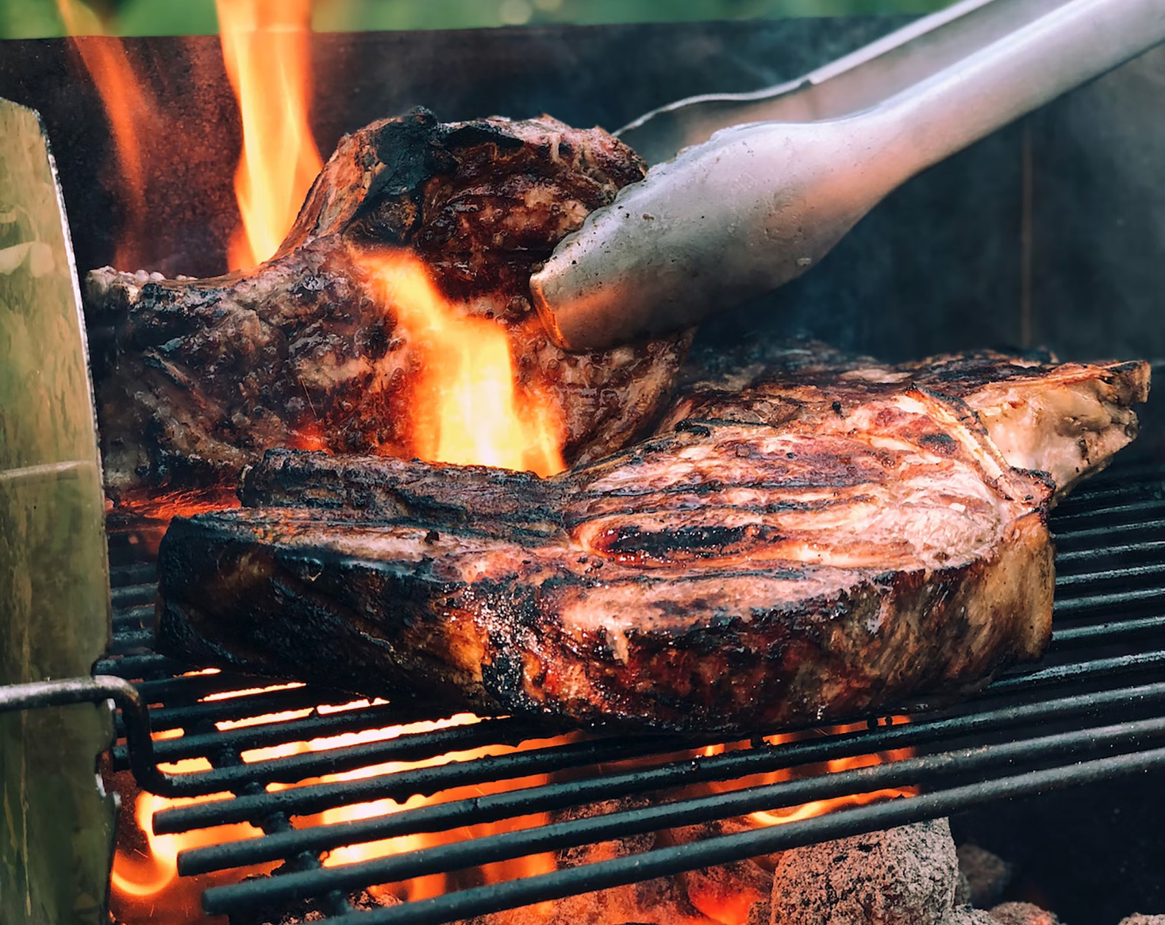 t-bone vs ribeye steak on the grill open flame