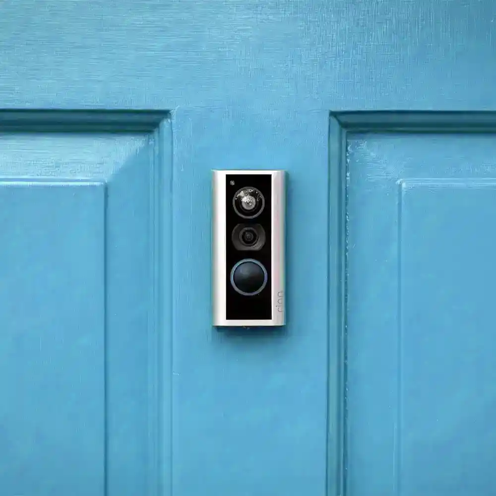 Ring peephole cam mounted to a light blue front door 1.0