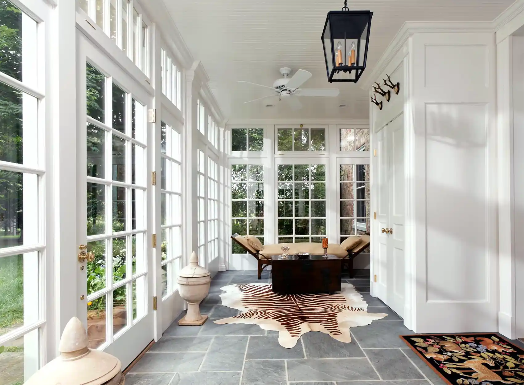 patio enclosure sunroom banner 1.0, bluestone tile floors, white floor to ceiling windows