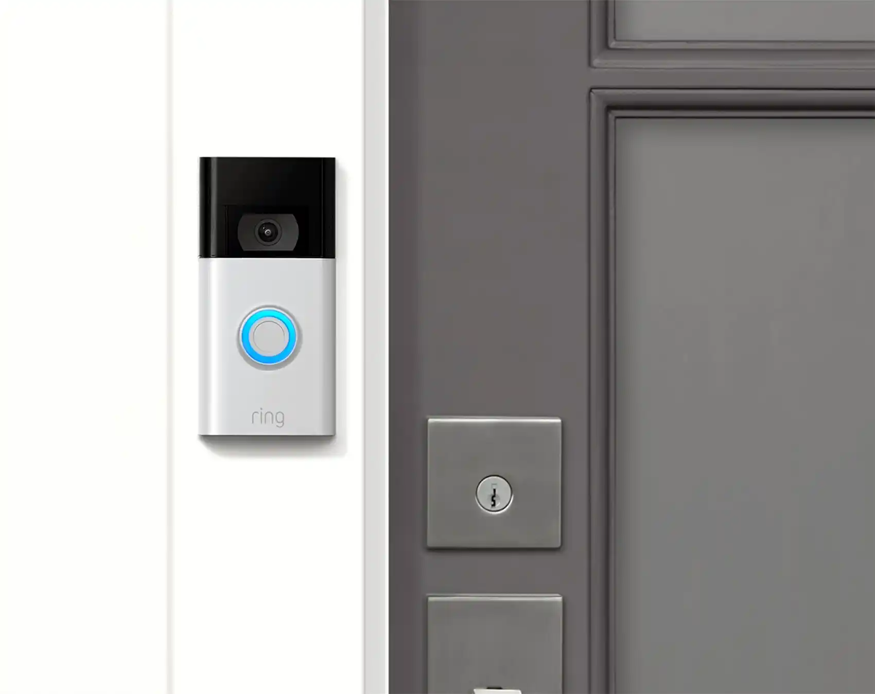 Ring doorbell on white trim modern gray door