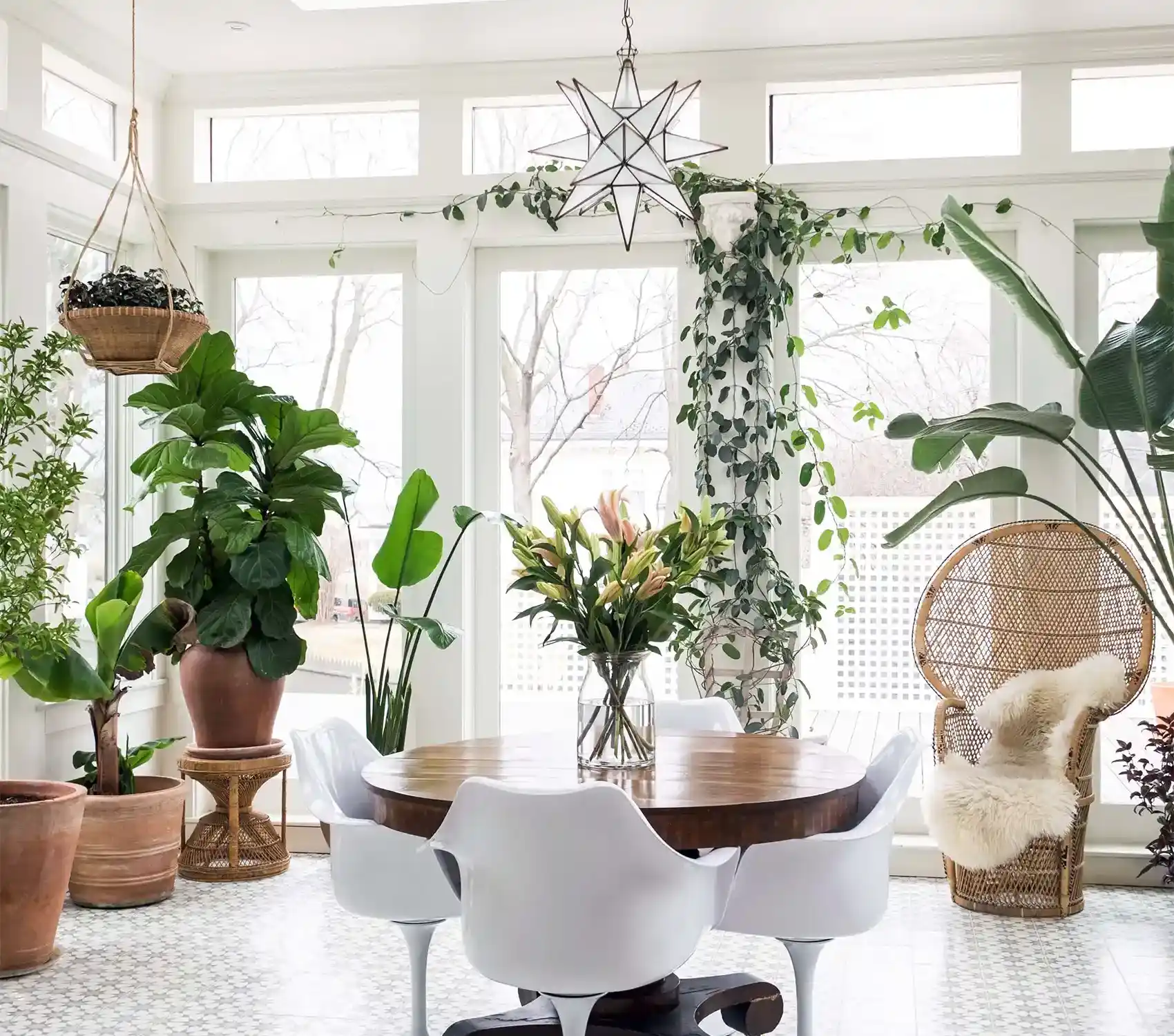 sunroom contractors Avon-by-the-Sea NJ, white sunroom with huge windows and lots of plants